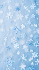 Fototapeta na wymiar Snowy background with snowflakes. Flat lay.