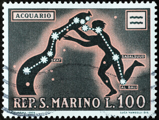 Zodiac sign of water-bearer on postage stamp - obrazy, fototapety, plakaty