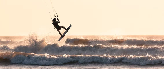 Rolgordijnen kite surfer jumping over the waves  © Agata Kadar