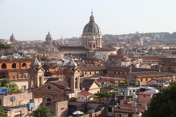 Fototapeta na wymiar panorama of Rome with roofs and dome of St. Peter's Cathedral