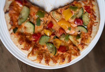delicious tasty pizza in a light plate