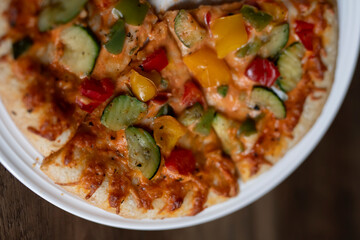delicious tasty pizza in a light plate