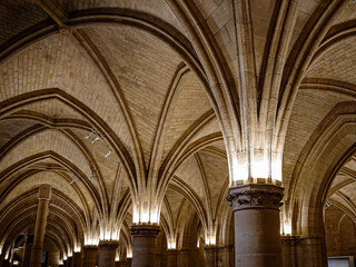 Naklejka premium Historical French prison with medieval architecture and dark hallway, old courthouse in Paris