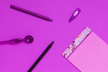 Notebook with purple color composition, colorful minimalist, tidy desk with office objects, problem...