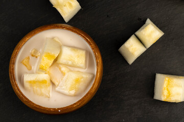 creamy yogurt with melon flavor and chunks