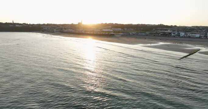 Beautiful views from the sea to the old European city on the sunset 4k