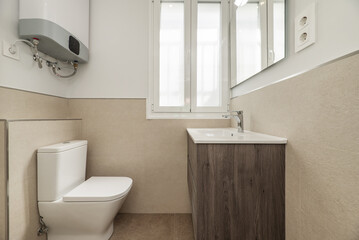 Fototapeta na wymiar bathroom with a new wooden cabinet with white porcelain sink