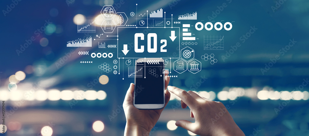 Poster reduce co2 theme with person using a smartphone