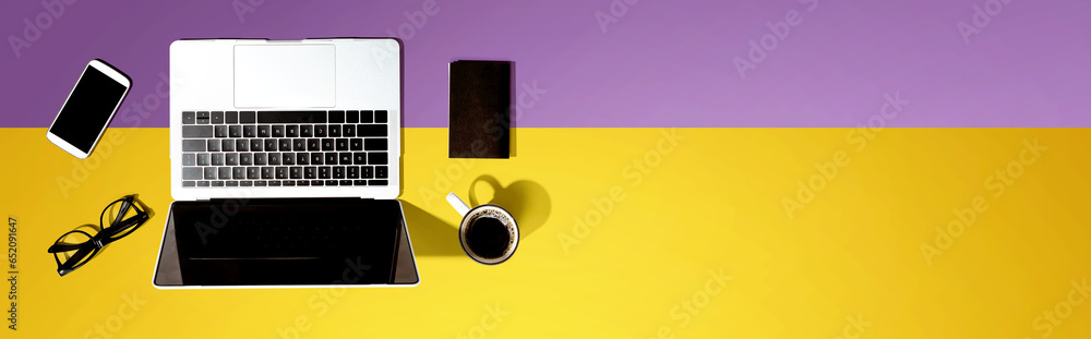 Aufkleber laptop computer with a smartphone and office objects