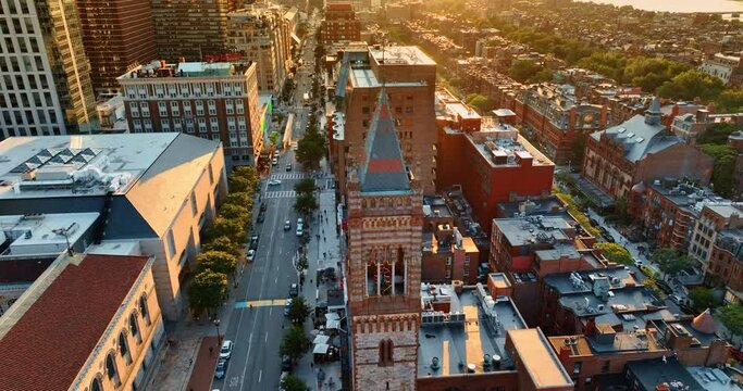 Golden hour in Boston, Massachusetts, USA. Drone flying above the tower of Old South Church.
