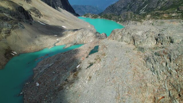 Colorful Turquoise Water in Canadian Alpine Lake Aerial