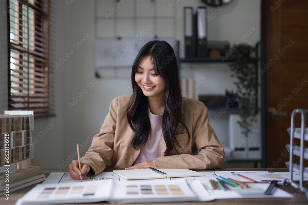 Poster female architect work to designing architecture interior and drawing building project on blueprint