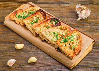 Toasted Bread with Oil and Garlic in Wood Fountain