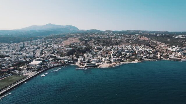 Agios Nikolaos aerial panoramic view. Agios, Hagios or Aghios Nikolaos is a coastal city on the island of Crete in Greece. High quality 4k footage