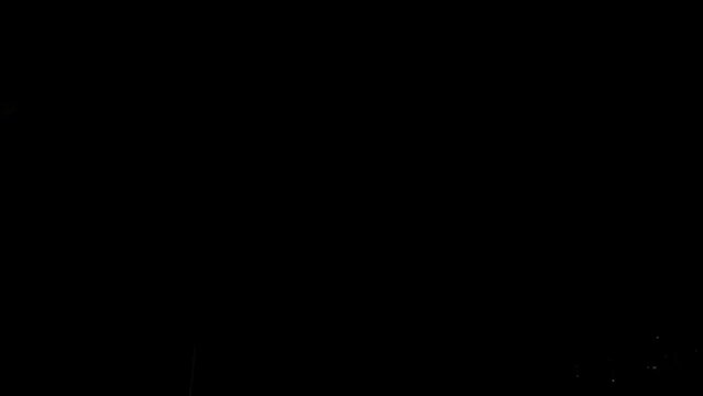 Natural lightning sparks at night forest dramatic night sky electric stormy effect glowing ray in slow motion. Picturesque flash disaster flare powerful hit ray shock thunderstorm line at dark 4k