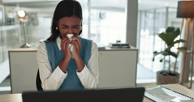 Business woman, sick and blowing nose in office for allergies, cold and virus. Indian employee sneeze with tissue for infection of influenza, allergy and risk of bacteria, sinusitis and hayfever