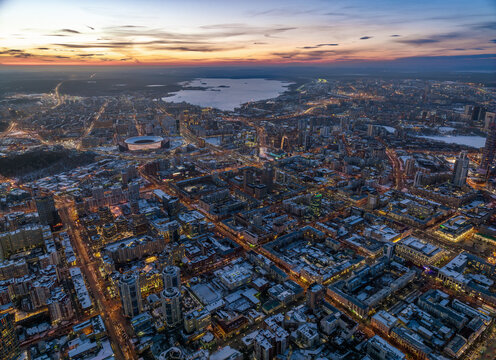 Yekaterinburg aerial panoramic view in Winter at sunset. Ekaterinburg is the fourth largest city in Russia located in the Eurasian continent on the border of Europe and Asia. © Dmitrii Potashkin