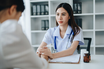 A doctor psychologist is giving counseling to a depressed patient