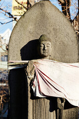 Buddhist statue made of stone in the park