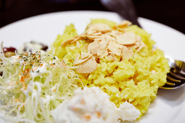 Curry and vegetable salad on a plate