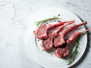 Raw lamb ribs seasoned with various spices