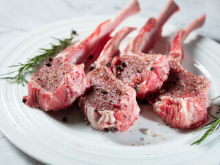 Raw lamb ribs seasoned with various spices