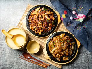 Stir-fried octopus, stir-fried pork, and traditional alcohol