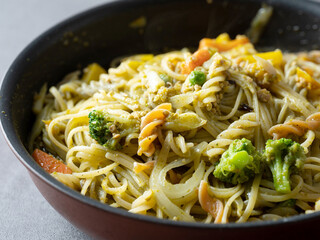 Basil oil pasta in a pan