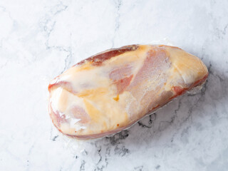 Raw ham chunks packed in vacuum packs