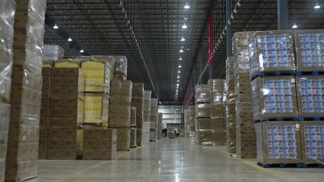 Distribution Warehouse with Forklifts moving in the background at undisclosed location