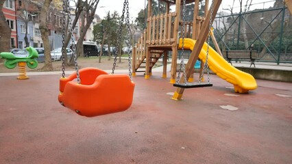 Close-up of a baby swing in the playground