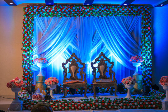 Indian Wedding Stage. Indian wedding decoration. Indian beautiful marriage decoration with flowers. Indian wedding sangeet night stage