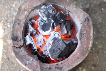 The brazier for grill and boil. burning charcoal and ashes