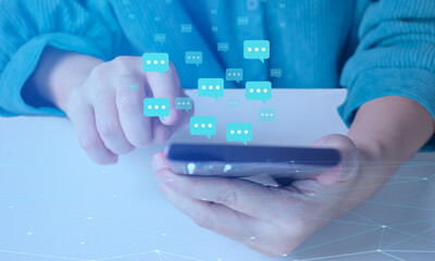 Woman hold smartphone with chatting hologram speech bubbles and Icon. Speech bubbles for a chat. Text sms, Text online conversation mockup. a Messenger interface.