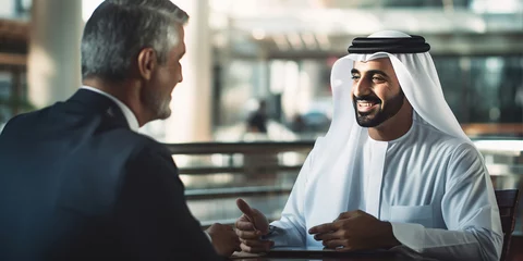Fotobehang Young Emirati businessman at a traditional meeting in the UAE © xartproduction