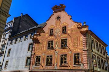 Ornate building with frescoes on the facade in the old town on Grande Ile, the historic center of Strasbourg, Alsace, France