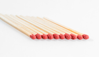 Match sticks objects collection. Group of identical matchsticks in a row isolated on a white background.