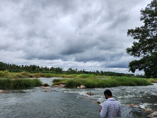 Srirangapatna, Karnataka India - July 26 2023: Kaveri River flows near Nimishamba temple known as Srirangapattana Ghat.