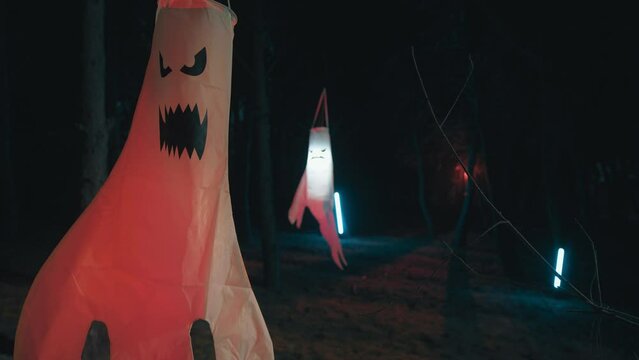 Ghost glowing in the night forest for halloween