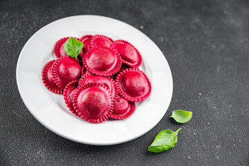raw beetroot ravioli beet red pasta in the plate meal food snack on the table copy space food background rustic top view