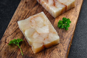 raw fish briquette fillet seafood defrost meal food snack on the table copy space food background rustic top view