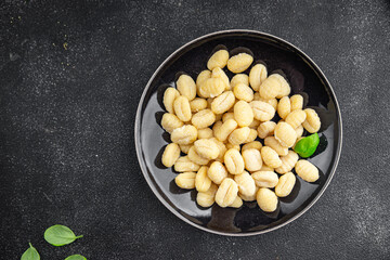 raw gnocchi potato food cooking meal food snack on the table copy space food background rustic top view 