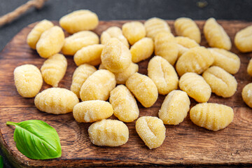 raw gnocchi potato food cooking meal food snack on the table copy space food background rustic top view 