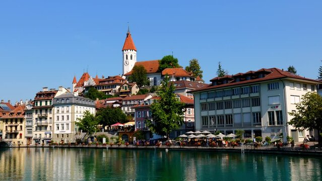 Cityscape over River Aare and Castle and Church of Thun in a Sunny Summer Day in Thun, Bernese Oberland, Bern Canton, Switzerland, Europe