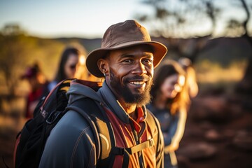 Obraz premium Aboriginal guide leading a group through the rugged landscape, sharing ancestral knowledge, Generative AI