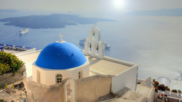 Beautiful view of the blue dome of Firostefani in Santorini (Greece)
