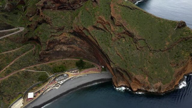 Praia do Garajau And Cristo Rei Statue In Garajau, Madeira Near Canico Townscape In Portugal. Aerial Drone Shot