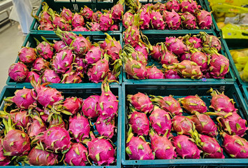 Pile of Dragon fruit in supermarket a local market in Thailand, Organic Dragon fruit in...