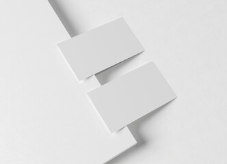 Two white business card Mockup. Textured calling card template on a blank surface. 3D rendering