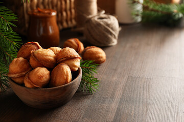 Cookies Nuts in a bowl with a sprig of needles